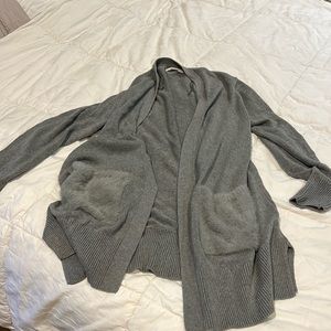 UGG sweater gray size large, great condition. Fuzzy pockets warm and cozy!